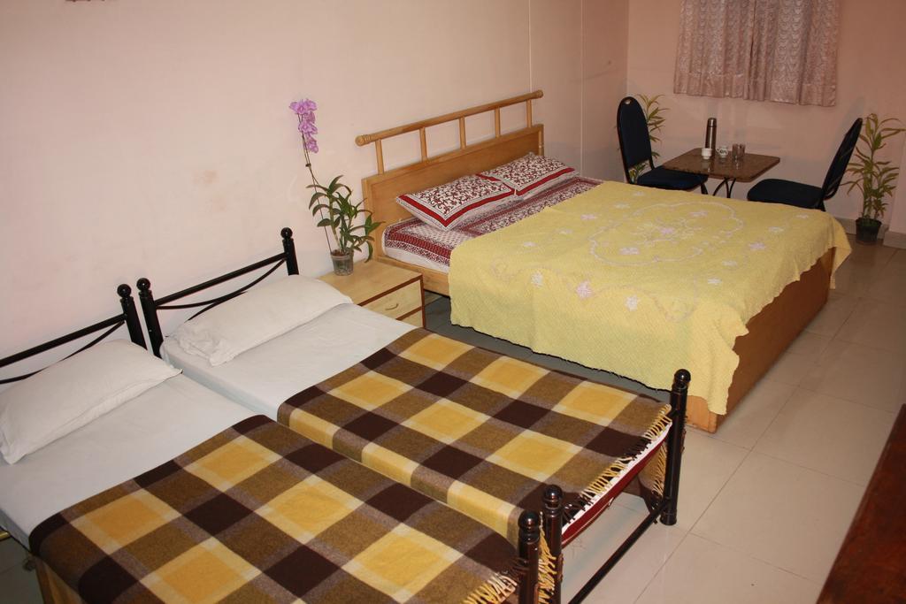 Minerva Residency Bangalore Quarto foto